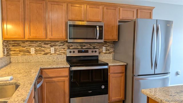 413 Village Drive, Walled Lake, MI 48390