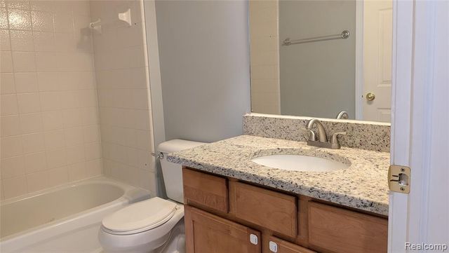 413 Village Drive, Walled Lake, MI 48390