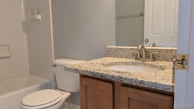 413 Village Drive, Walled Lake, MI 48390