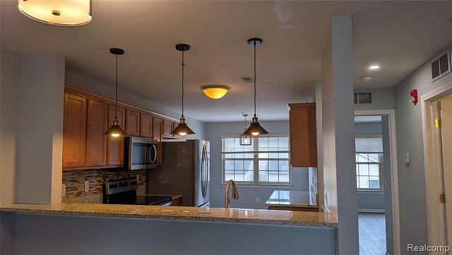 413 Village Drive, Walled Lake, MI 48390