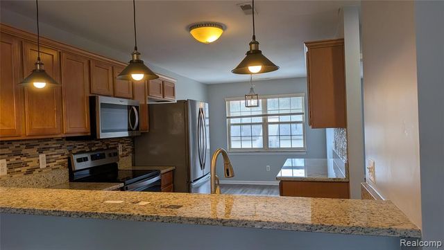 413 Village Drive, Walled Lake, MI 48390