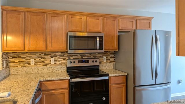 413 Village Drive, Walled Lake, MI 48390