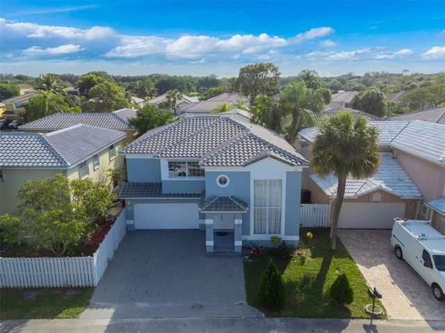 4450 NW 55th Drive, Coconut Creek, FL 33073