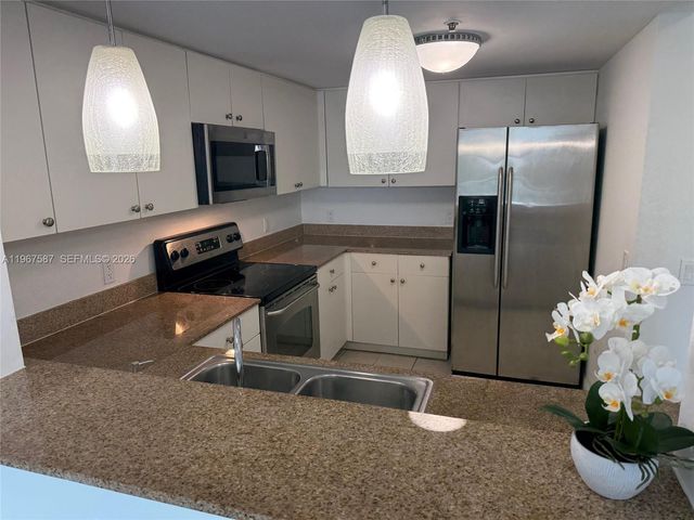 60 NW 37th Ave 700, Miami, FL 33125