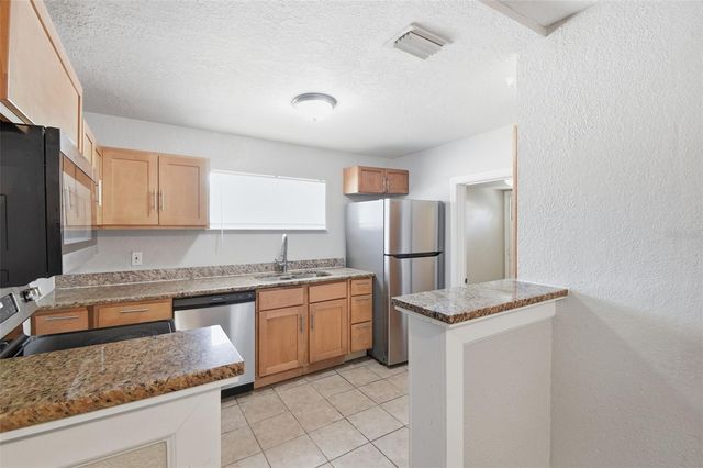 1410 E WATERS AVENUE, Tampa, FL 33604