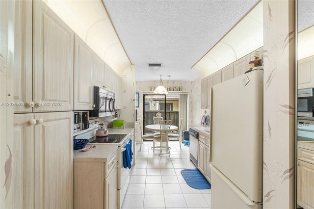 3953 Cocoplum Circle, Coconut Creek, FL 33063