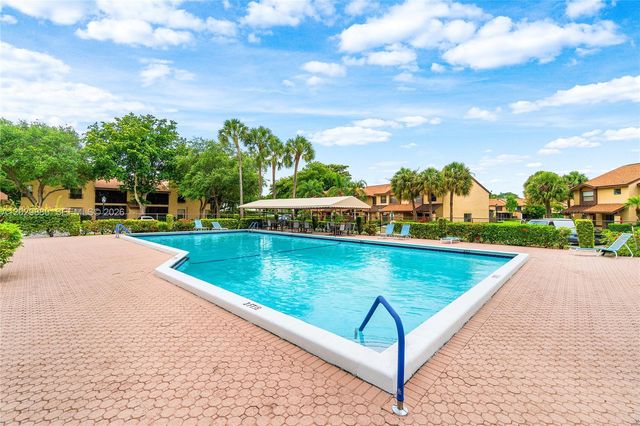 3953 Cocoplum Circle, Coconut Creek, FL 33063