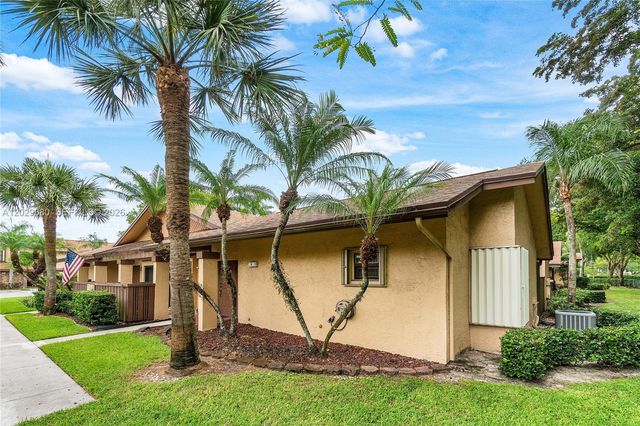 3953 Cocoplum Circle, Coconut Creek, FL 33063