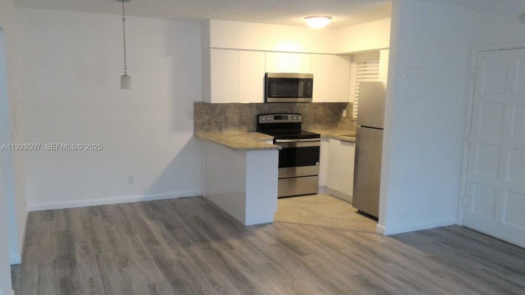 Image 1 of property listing at 1755 NE 116th Rd 15, North Miami, FL 33181