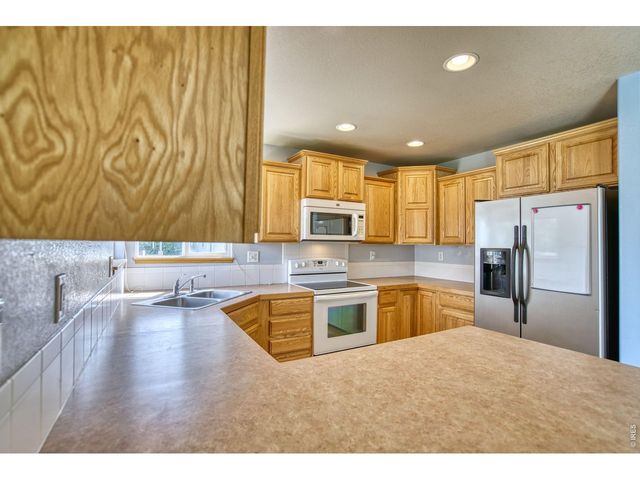 3374 Wild West Ln, Wellington, CO 80549
