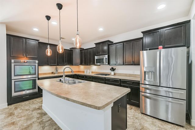 24622 Emerald Pool Falls Drive, Tomball, TX 77375