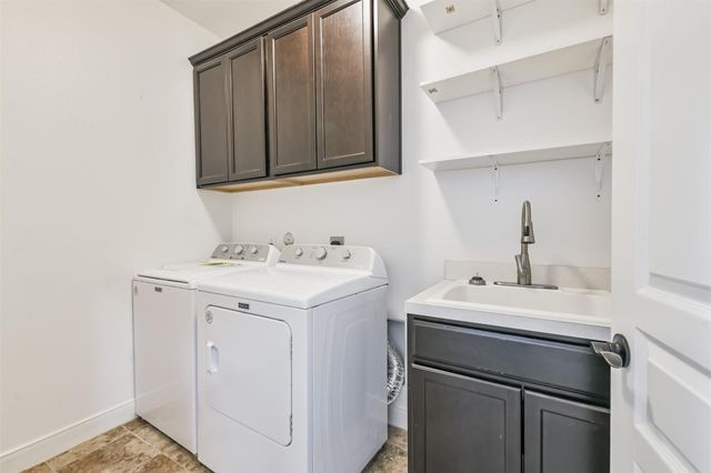 24622 Emerald Pool Falls Drive, Tomball, TX 77375