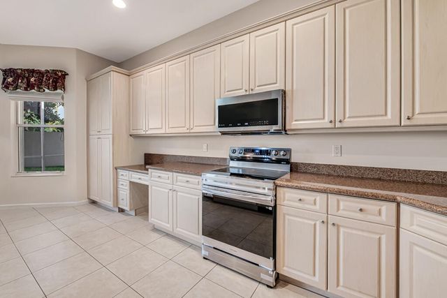 7718 OCEAN SUNSET Drive, Lake Worth, FL 33467