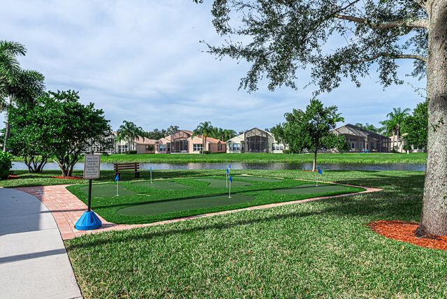 7718 OCEAN SUNSET Drive, Lake Worth, FL 33467