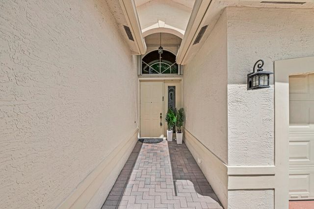 7718 OCEAN SUNSET Drive, Lake Worth, FL 33467