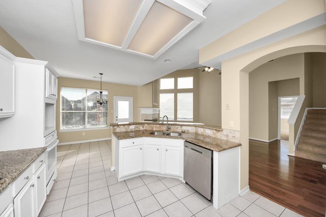 323 N Esplanade Lane, Stafford, TX 77477