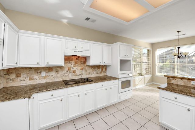323 N Esplanade Lane, Stafford, TX 77477