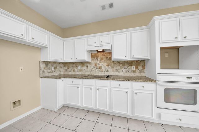 323 N Esplanade Lane, Stafford, TX 77477