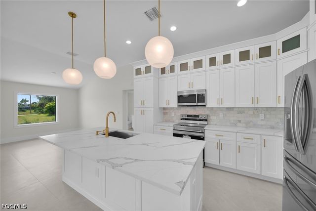 1213 NW 25th PL, Cape Coral, FL 33993
