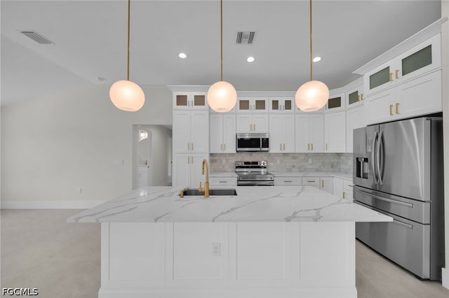 1213 NW 25th PL, Cape Coral, FL 33993