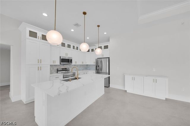 1213 NW 25th PL, Cape Coral, FL 33993