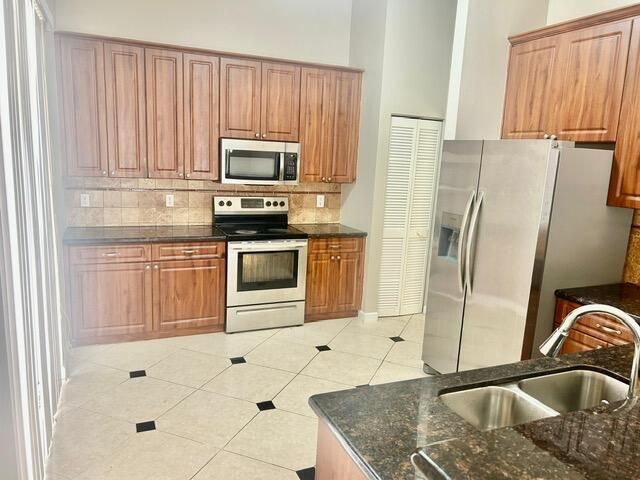 7584 Thornlee Drive, Greenacres, FL 33467