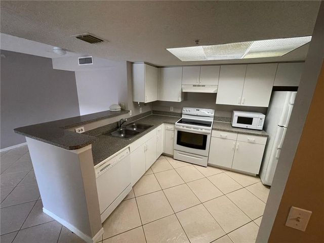 5025 WILES RD 101, Coconut Creek, FL 33073