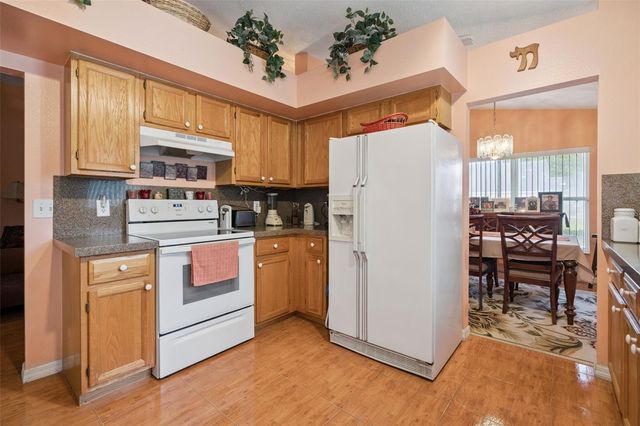 1237 WOODFLOWER WAY, Clermont, FL 34711