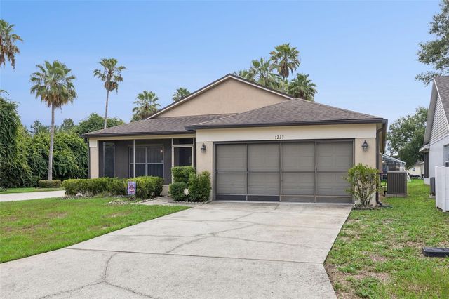 1237 WOODFLOWER WAY, Clermont, FL 34711