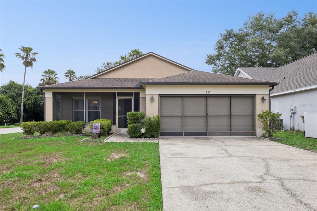 1237 WOODFLOWER WAY, Clermont, FL 34711