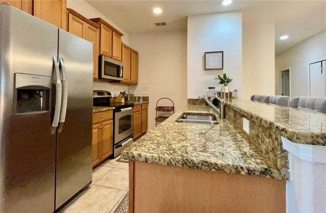 8964 CAT PALM ROAD, Kissimmee, FL 34747