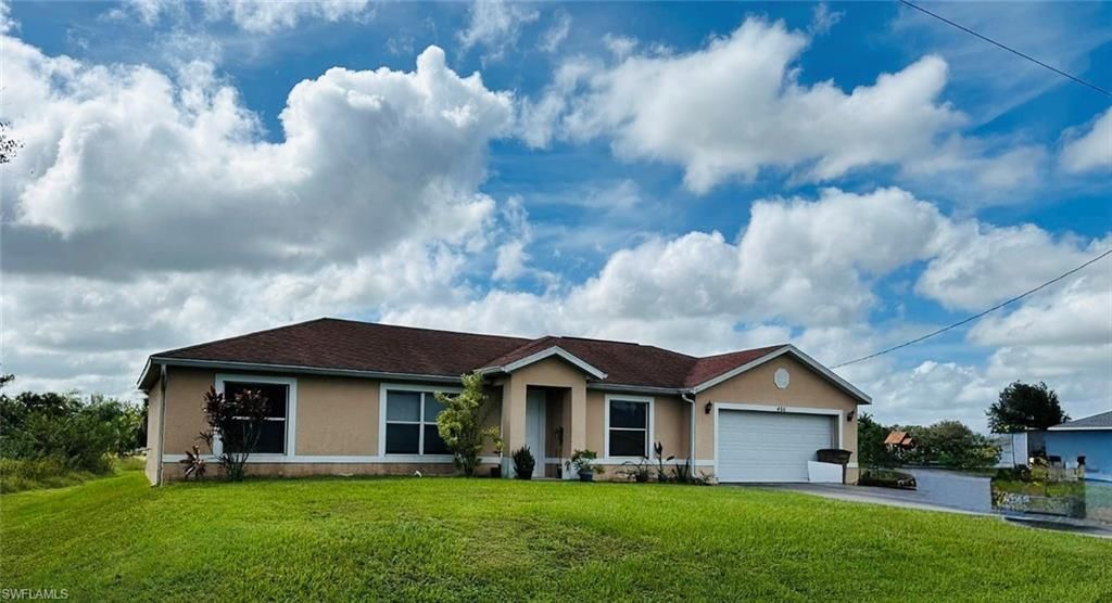 466 Redwing ST, LEHIGH ACRES, FL 33974 — exterior