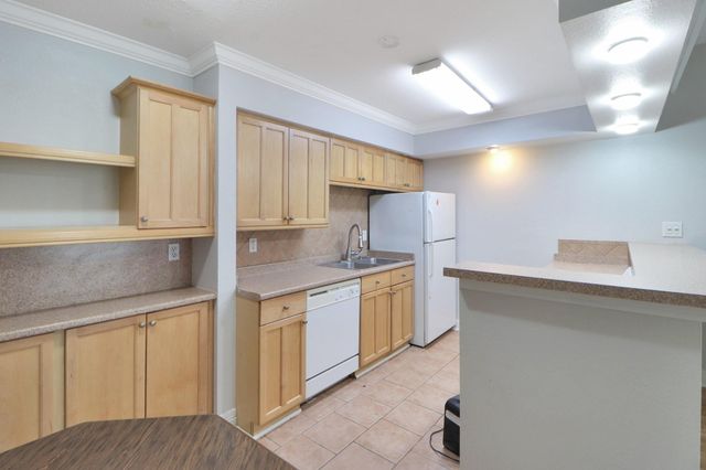 5929 Queensloch Drive 104, Houston, TX 77096