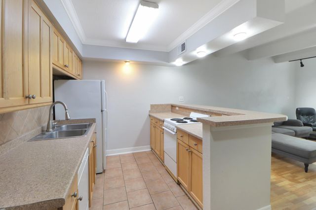 5929 Queensloch Drive 104, Houston, TX 77096