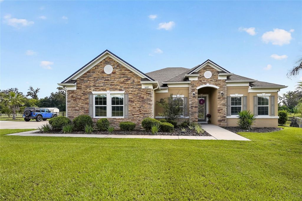 Image 1 of property listing at 5697 SW 215TH TERRACE, Newberry, FL 32669