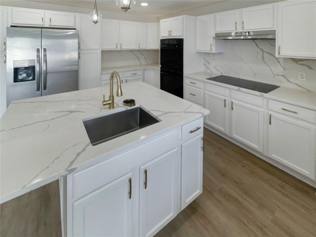 2109 AITKIN LOOP, Leesburg, FL 34748