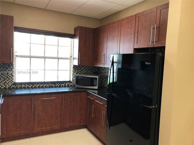 693 Live Oak Ln, Weston, FL 33327