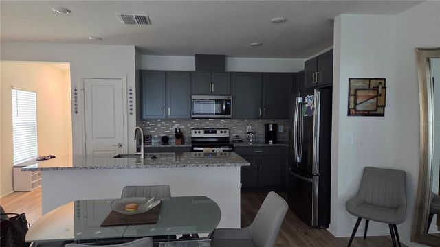 728 STONEY POINT CIRCLE, Davenport, FL 33896