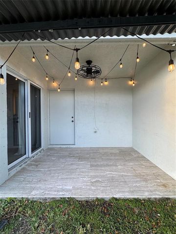 9530 E Plum Harbor Way, Tamarac, FL 33321
