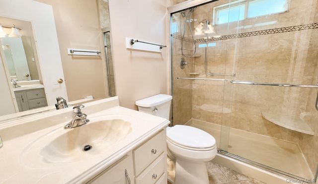 344 Woodbridge Drive B, Ridge, NY 11961