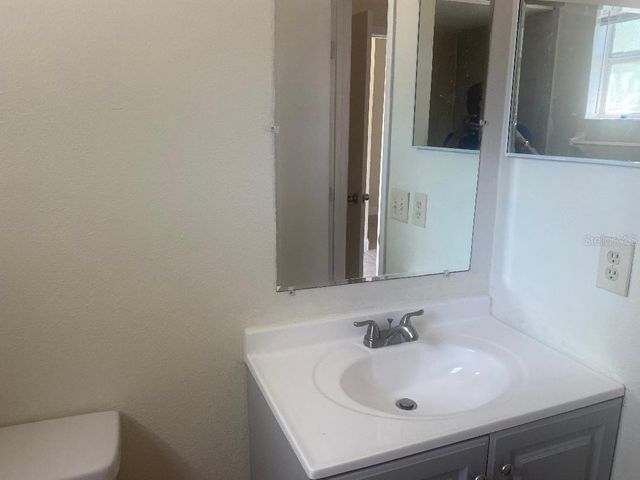 1003 WINTERBERRY LANE, Orlando, FL 32811