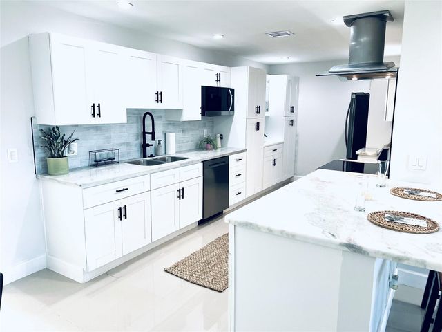 6520 Kimberly Boulevard, North Lauderdale, FL 33068