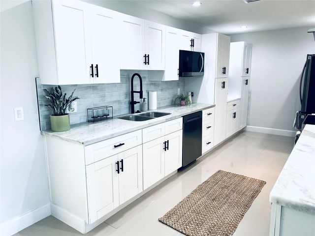 6520 Kimberly Boulevard, North Lauderdale, FL 33068