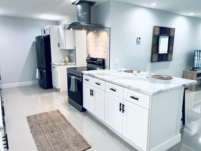 6520 Kimberly Boulevard, North Lauderdale, FL 33068