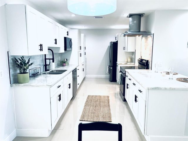 6520 Kimberly Boulevard, North Lauderdale, FL 33068