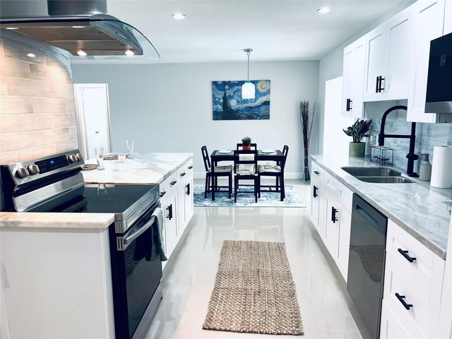 6520 Kimberly Boulevard, North Lauderdale, FL 33068