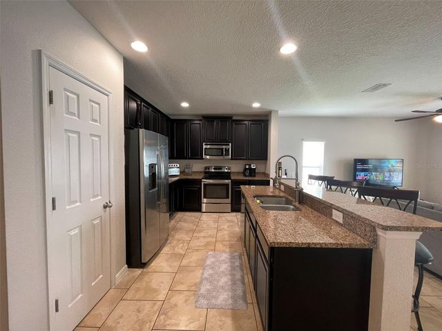 9886 LENOX STREET, Clermont, FL 34711