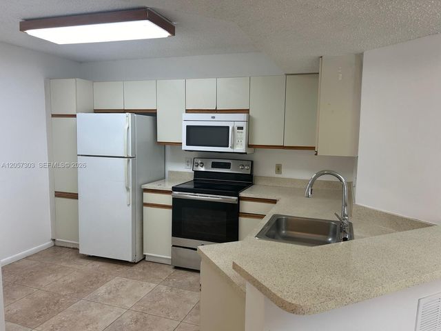 8851 Wiles Rd 208, Coral Springs, FL 33067