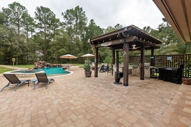 1702 Country Creek Court, Magnolia, TX 77354