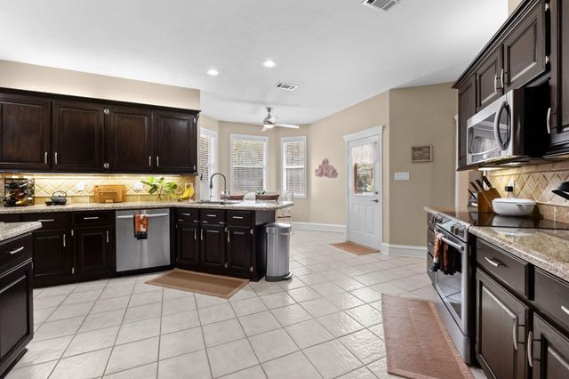 1702 Country Creek Court, Magnolia, TX 77354